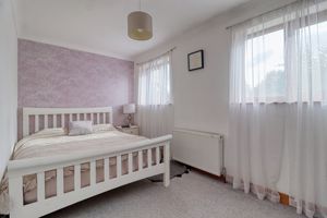 Bedroom One- click for photo gallery